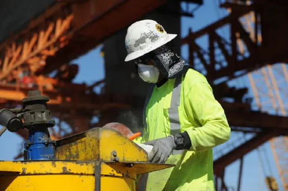 Union member working with machinery